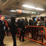 The queue from another angle; NYC Transit President Andy Byford is by the barricade, talking to customers. (Jake Offenhartz / Gothamist)